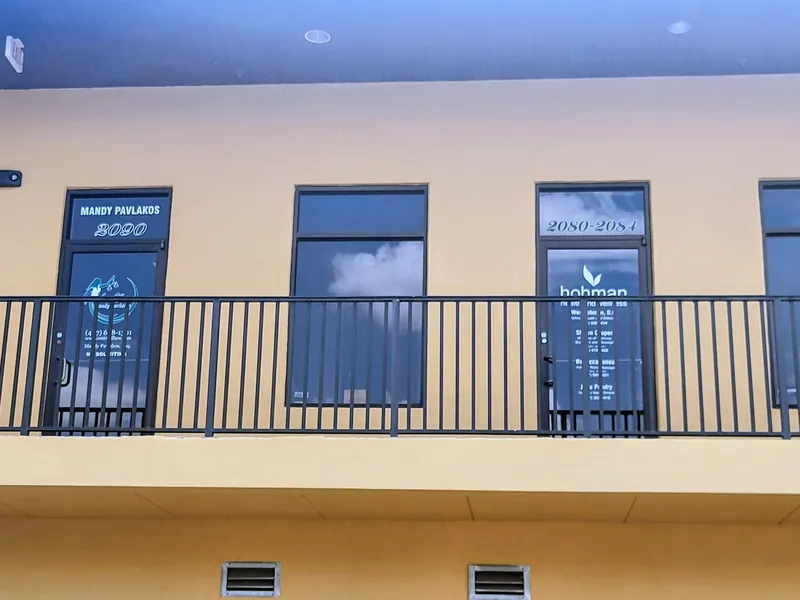 Second floor walkway showing the 2080 and 2080&ndash;2084 suite numbers in Lake Mary, FL